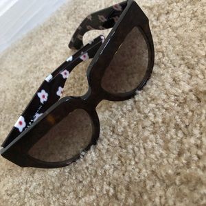 Prada Sunglasses.